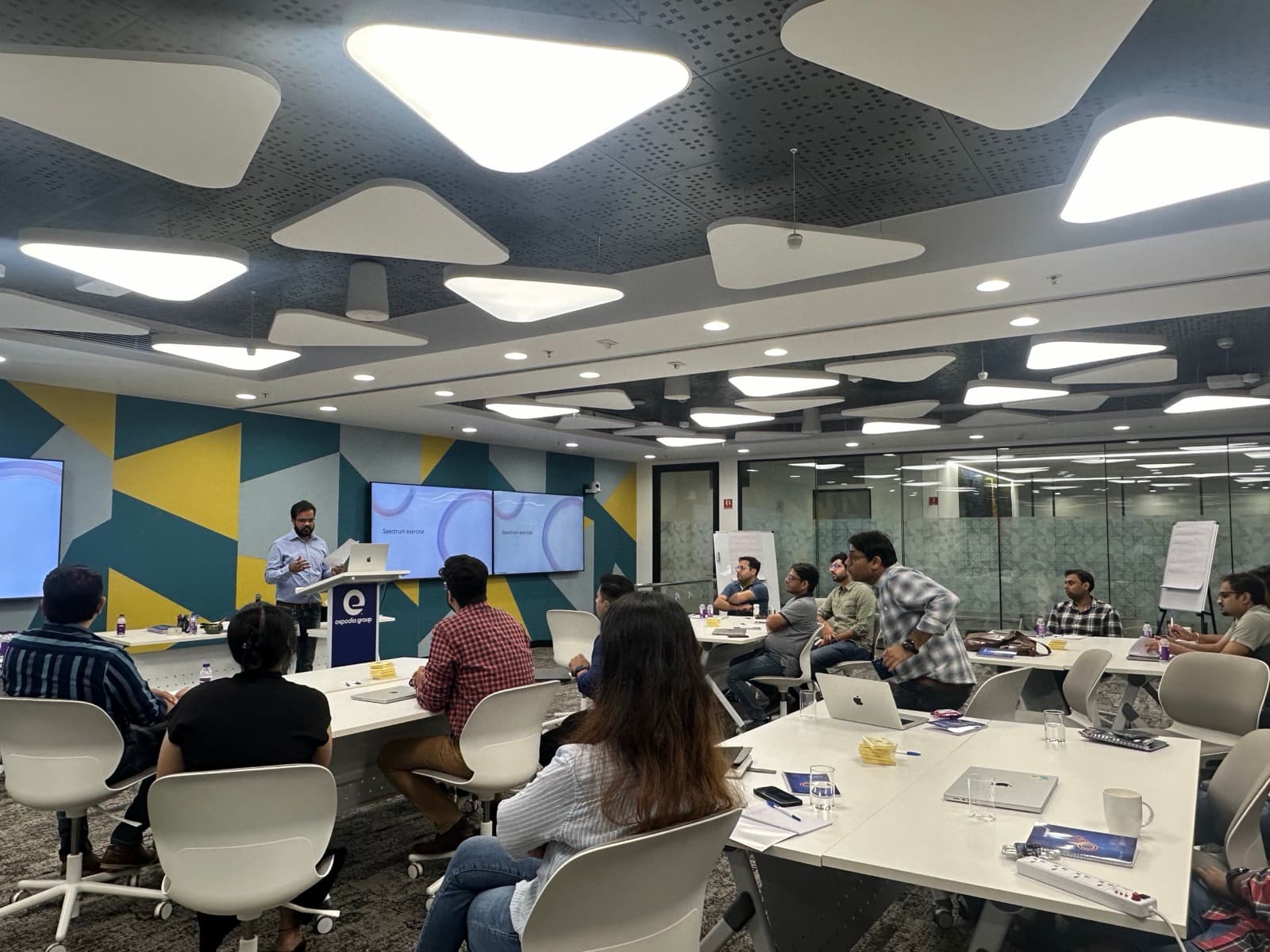 Amit Kumar Soni leading an AI ethics workshop in a modern training room.