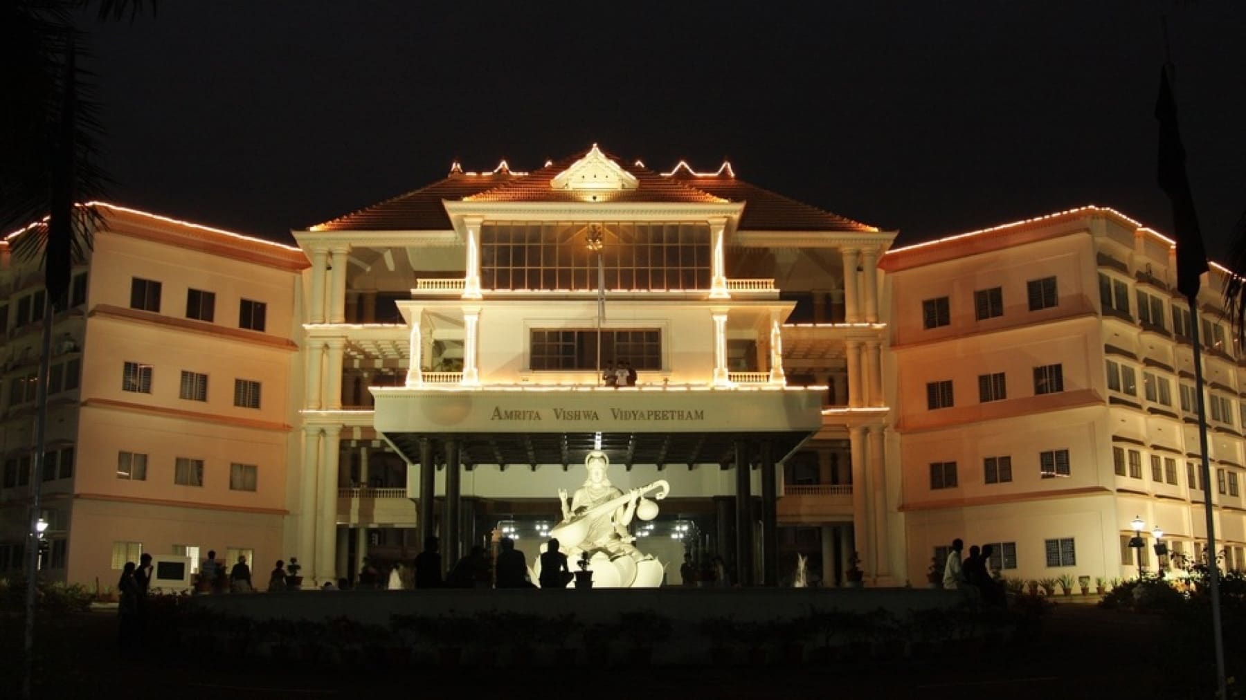 Amrita Vishwa Vidyapeetham, illuminated at night.